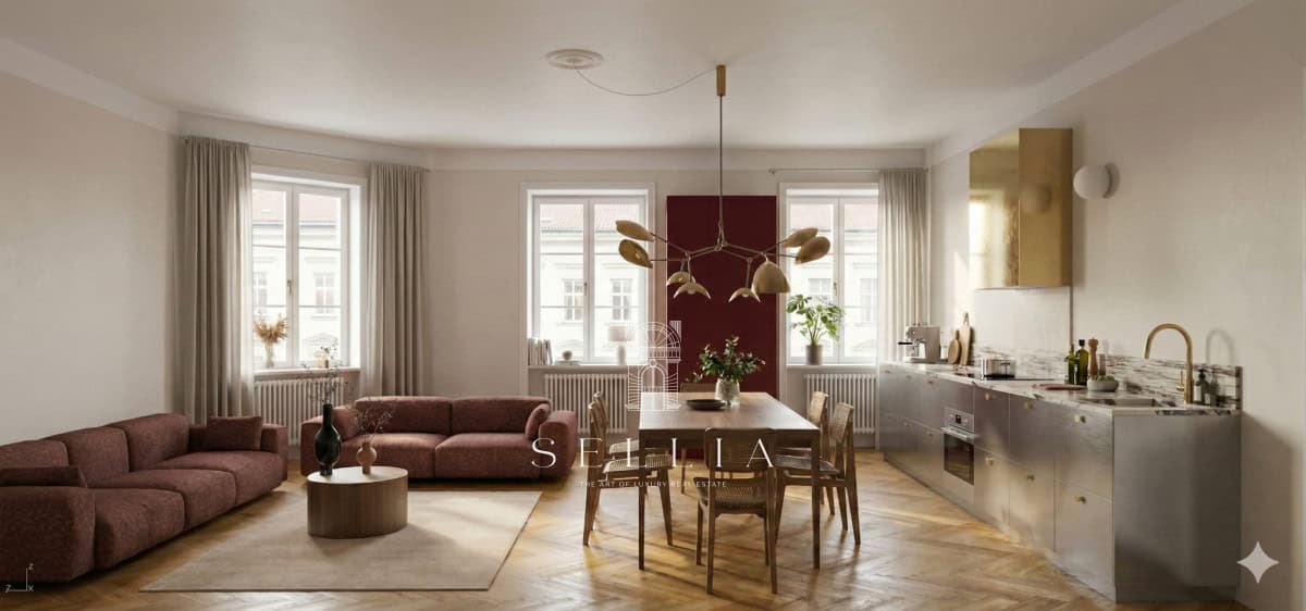 Jasny, przestronny salon z dużymi oknami i nowoczesnym wystrojem w kamienicy na Hożej.