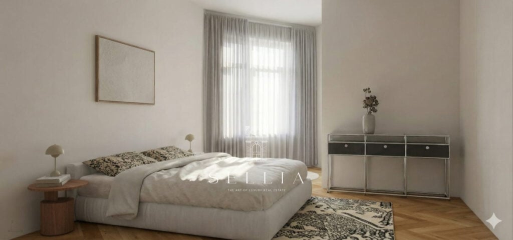 Apartament w kamienicy na ul. Hoża, jasne wnętrze z dużym oknem, minimalistyczny wystrój, idealny do.